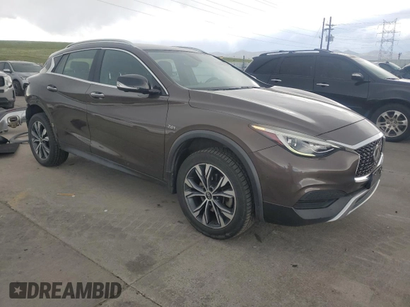 2019 Infiniti QX30 Luxe with VIN SJKCH5CR1KA009121, listed as a Copart auction lot 55252695 with 95,931 mi miles and Salvage title. Bid and sale history available at DreamBid. Image 4.