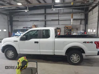 2015 Ford F-150 XLT with VIN 1FTFX1EF3FKD59476, listed as a IAAI auction lot 42622270 with 201,039 mi miles and . Bid and sale history available at DreamBid. Image 14.