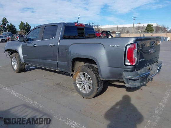 2018 GMC Canyon 4WD SLT with VIN 1GTP6DE11J1302382, listed as a IAAI auction lot 41318784 with 114,981 mi miles. Bid and sale history available at carsss.com. Image 3.