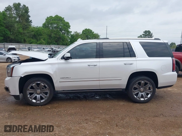 2016 GMC Yukon Denali with VIN 1GKS1CKJ7GR237852, listed as a IAAI auction lot 41944398 with 65,703 mi miles. Bid and sale history available at carsss.com. Image 15.