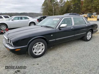 2003 Jaguar XJ Vanden Plas with VIN SAJDA24CX3LF55964, listed as a Copart auction lot 79812444 with 173,281 mi miles and Salvage title. Bid and sale history available at DreamBid. Image 1.