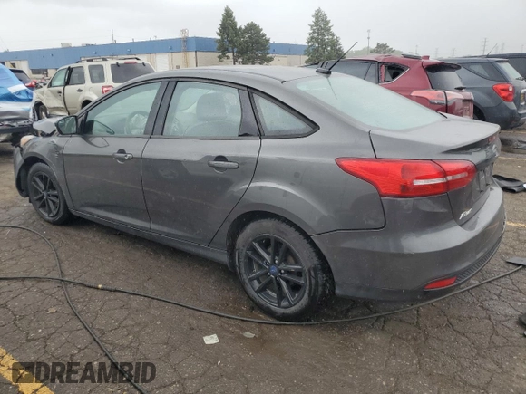 2016 Ford Focus SE with VIN 1FADP3F24GL312246, listed as a Copart auction lot 58564955 with 146,598 mi miles and Clean title. Bid and sale history available at DreamBid. Image 2.