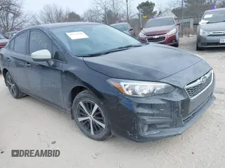 2019 Subaru Impreza Premium with VIN 4S3GKAD63K3604334, listed as a IAAI auction lot 41271928 with 70,786 mi miles. Bid and sale history available at carsss.com. Image 1.