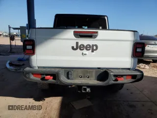 2022 Jeep Gladiator Rubicon with VIN 1C6JJTBG3NL103293, listed as a Copart auction lot 45599755 with Not provided miles and Salvage title. Bid and sale history available at DreamBid. Image 6.