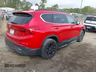 2022 Hyundai Santa Fe SEL with VIN 5NMS64AJ6NH393466, listed as a IAAI auction lot 41943864 with 12,676 mi miles and . Bid and sale history available at DreamBid. Image 4.