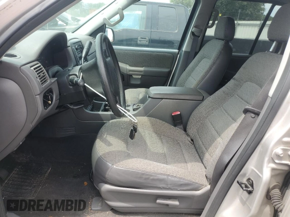 2005 Ford Explorer XLS with VIN 1FMZU72E15UA26499, listed as a Copart auction lot 58125945 with 196,774 mi miles and Salvage title. Bid and sale history available at DreamBid. Image 7.