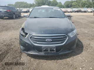 2013 Ford Taurus Limited with VIN 1FAHP2J87DG181051, listed as a Copart auction lot 70630404 with 157,323 mi miles and Salvage title. Bid and sale history available at DreamBid. Image 5.