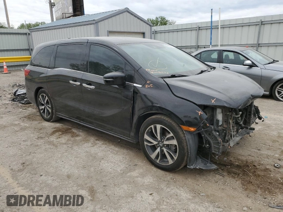 2018 Honda Odyssey Elite with VIN 5FNRL6H92JB024856, listed as a Copart auction lot 52409895 with 123,264 mi miles and Salvage title. Bid and sale history available at DreamBid. Image 4.