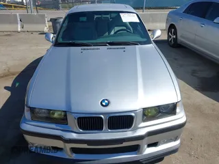 1999 BMW 3 Series M3 with VIN WBSBG9333XEY80647, listed as a IAAI auction lot 42216141 with 98,700 mi miles and . Bid and sale history available at carsss.com. Image 6.