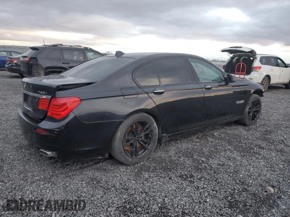 2011 BMW 7 Series 750i xDrive with VIN WBAKC6C54BC395163, listed as a Copart auction lot 82184484 with 74,331 mi miles and Clean title. Bid and sale history available at DreamBid. Image 3.