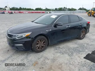 2020 Kia Optima LX with VIN 5XXGT4L35LG384086, listed as a IAAI auction lot 42319644 with 124,816 mi miles and . Bid and sale history available at DreamBid. Image 2.