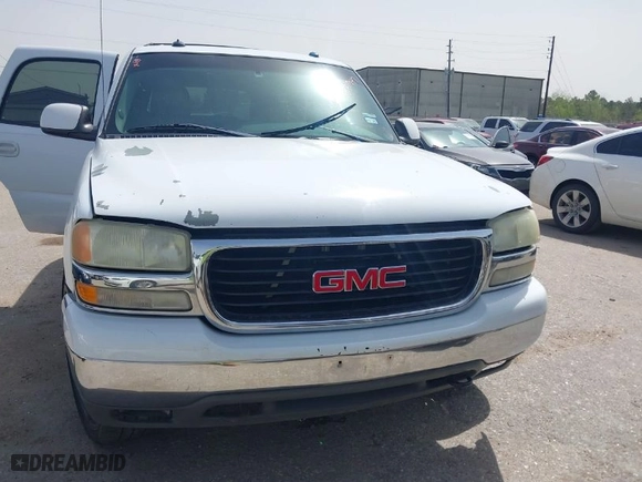 2003 GMC Yukon SLT with VIN 1GKEC13Z33R156583, listed as a IAAI auction lot 41831947 with 156,309 mi miles. Bid and sale history available at carsss.com. Image 6.