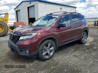 2019 Honda Passport Touring z VIN 5FNYF8H90KB022684, wystawiony jako Copart lot #56800895 z przebiegiem 62 020 mil mil oraz Szkoda całkowita • Salvage title. Historia ofert i sprzedaży dostępna na DreamBid. Obrazek 1.