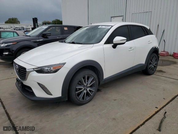 2018 Mazda CX-3 Touring with VIN JM1DKFC75J0327924, listed as a Copart auction lot 50775305 with 124,011 mi miles and Salvage Title. Bid and sale history available at carsss.com. Image 1.