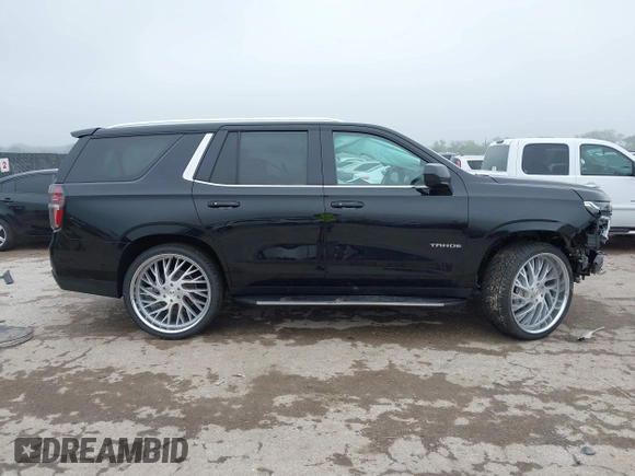 2021 Chevrolet Tahoe LT with VIN 1GNSCNKDXMR172381, listed as a IAAI auction lot 42168263 with 89,112 mi miles and . Bid and sale history available at DreamBid. Image 14.