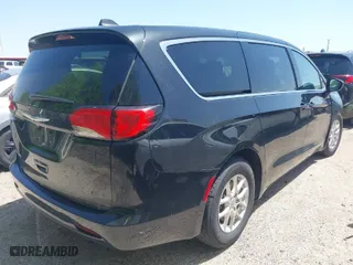 2023 Chrysler Voyager LX with VIN 2C4RC1CG1PR597348, listed as a IAAI auction lot 42013850 with 61,844 mi miles. Bid and sale history available at carsss.com. Image 4.