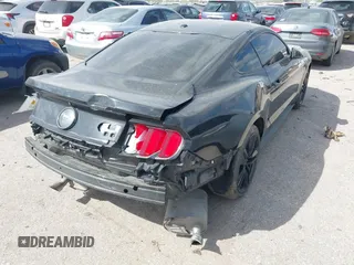 2015 Ford Mustang EcoBoost with VIN 1FA6P8THXF5395540, listed as a IAAI auction lot 41812384 with 118,150 mi miles and . Bid and sale history available at carsss.com. Image 4.