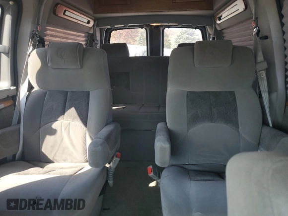 2005 Chevrolet Express Cargo Van YF7 Upfitter with VIN 1GBFG15T451209911, listed as a Copart auction lot 77113804 with 165,278 mi miles and Salvage Title. Bid and sale history available at carsss.com. Image 10.