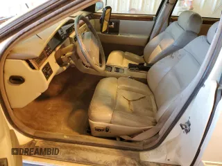 1993 Cadillac Seville Touring STS z VIN 1G6KY5295PU817593, wystawiony jako Copart lot #47807075 z przebiegiem Nie podano mil oraz Czysty tytuł • Clean title. Historia ofert i sprzedaży dostępna na DreamBid. Obrazek 7.