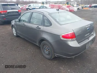 2009 Ford Focus S with VIN 1FAHP34N39W151811, listed as a IAAI auction lot 41911138 with 125,325 mi miles. Bid and sale history available at carsss.com. Image 3.