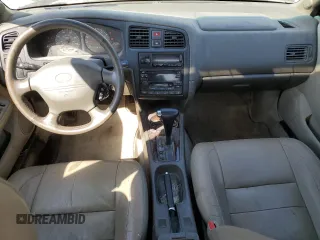 2000 Infiniti G20 Luxury z VIN JNKCP11A5YT311938, wystawiony jako Copart lot #48509185 z przebiegiem 186 595 mil mil oraz Szkoda całkowita • Salvage title. Historia ofert i sprzedaży dostępna na DreamBid. Obrazek 8.