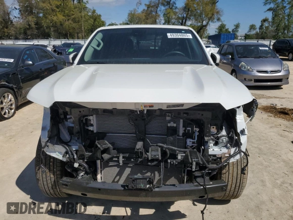2023 Nissan Frontier Pro-X with VIN 1N6ED1EJ1PN672564, listed as a Copart auction lot 49304865 with 13,575 mi miles and Salvage title. Bid and sale history available at DreamBid. Image 5.