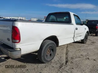 1998 Ford F-150 z VIN 2FTZF1769WCB07152, wystawiony jako IAAI lot #41748157 z przebiegiem 295 887 mil mil oraz . Historia ofert i sprzedaży dostępna na DreamBid. Obrazek 12.