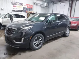 2023 Cadillac XT5 AWD Premium Luxury with VIN 1GYKNDRS2PZ122350, listed as a IAAI auction lot 42123718 with 17,971 mi miles and . Bid and sale history available at DreamBid. Image 2.