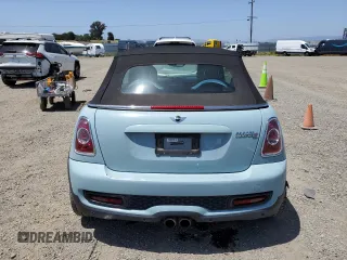 2013 MINI Convertible S z VIN WMWZP3C54DT551321, wystawiony jako Copart lot #57089205 z przebiegiem 92 441 mil mil oraz Szkoda całkowita • Salvage title. Historia ofert i sprzedaży dostępna na DreamBid. Obrazek 6.