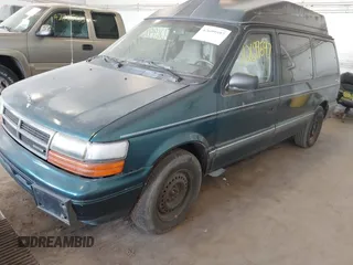 1995 Dodge Caravan Grand SE with VIN 1B4GH44R3SX566801, listed as a IAAI auction lot 42699597 with 103,069 mi miles and . Bid and sale history available at DreamBid. Image 2.
