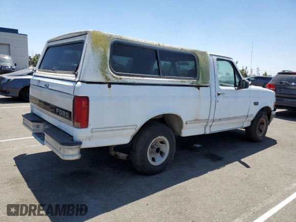 1992 Ford F-150 with VIN 1FTDF15Y7NLA93044, listed as a Copart auction lot 65185644 with 166,919 mi miles and Clean Title. Bid and sale history available at carsss.com. Image 3.