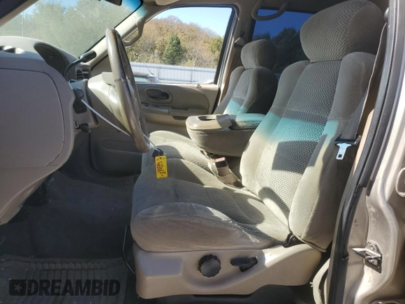 2002 Ford F-150 XLT with VIN 1FTRW07L22KB89313, listed as a Copart auction lot 76680834 with 377,443 mi miles and Salvage Title. Bid and sale history available at DreamBid. Image 7.