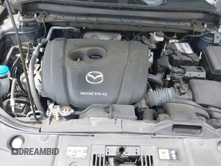 2020 Mazda CX-5 Touring with VIN JM3KFBCM9L0741535, listed as a IAAI auction lot 42101763 with 54,004 mi miles and . Bid and sale history available at DreamBid. Image 10.