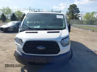 2019 Ford Transit z VIN 1FTYR2ZM1KKA68132, wystawiony jako IAAI lot #42094241 z przebiegiem 154 243 mil mil oraz . Historia ofert i sprzedaży dostępna na DreamBid. Obrazek 12.