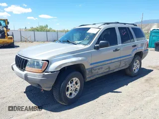2000 Jeep Grand Cherokee Laredo with VIN 1J4GW48S8YC172274, listed as a IAAI auction lot 39738087 with 335,809 mi miles and . Bid and sale history available at DreamBid. Image 2.