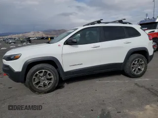 2020 Jeep Cherokee Trailhawk Elite with VIN 1C4PJMBN9LD628762, listed as a Copart auction lot 88525755 with 57,854 mi miles and Salvage title. Bid and sale history available at DreamBid. Image 1.