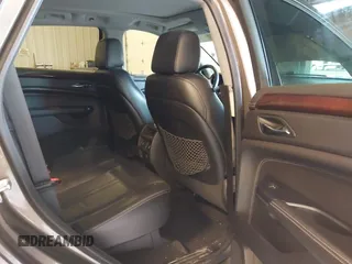 2015 Cadillac SRX Luxury Collection with VIN 3GYFNBE34FS575613, listed as a IAAI auction lot 41697251 with 173,117 mi miles and . Bid and sale history available at DreamBid. Image 8.