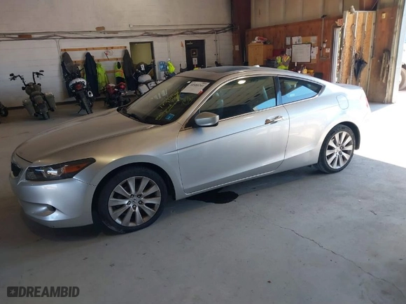 2009 Honda Accord Cpe EX-L with VIN 1HGCS22839A004302, listed as a IAAI auction lot 40580241 with 175,878 mi miles. Bid and sale history available at carsss.com. Image 2.