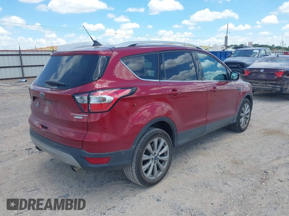 2018 Ford Escape Titanium with VIN 1FMCU0J96JUD58854, listed as a IAAI auction lot 42590609 with 77,825 mi miles and . Bid and sale history available at DreamBid. Image 4.