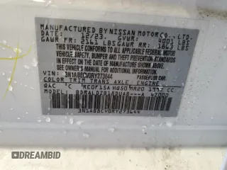2024 Nissan Sentra SV z VIN 3N1AB8CV0RY273644, wystawiony jako Copart lot #56705495 z przebiegiem 10 581 mil mil oraz Szkoda całkowita • Salvage title. Historia ofert i sprzedaży dostępna na DreamBid. Obrazek 13.