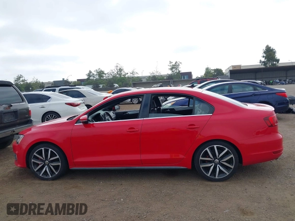 2014 Volkswagen Jetta GLI with VIN 3VW4T7AJ2EM246347, listed as a IAAI auction lot 42553341 with 140,793 mi miles and . Bid and sale history available at DreamBid. Image 14.