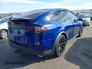 2022 Tesla Model X with VIN 7SAXCDE58NF341112, listed as a IAAI auction lot 41632491 with Not Provided miles and . Bid and sale history available at DreamBid. Image 4.