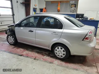 2009 Chevrolet Aveo LS with VIN KL1TD56E79B317607, listed as a Copart auction lot 84803254 with 84,242 mi miles and Salvage Title. Bid and sale history available at carsss.com. Image 2.