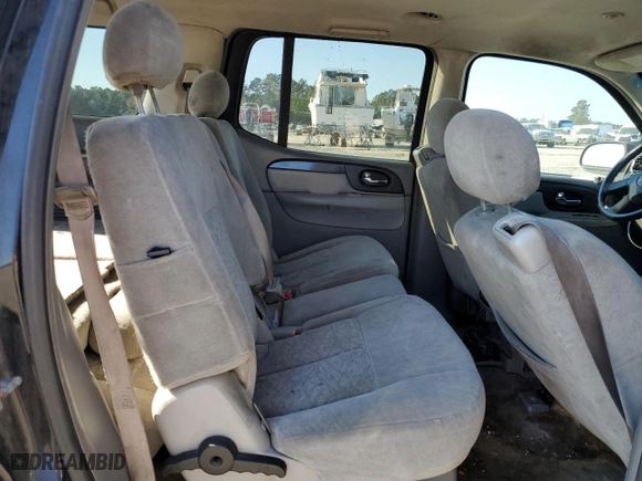 2005 GMC Envoy XL SLT with VIN 1GKET16S256109757, listed as a Copart auction lot 77220144 with 246,444 mi miles and Salvage Title. Bid and sale history available at carsss.com. Image 11.