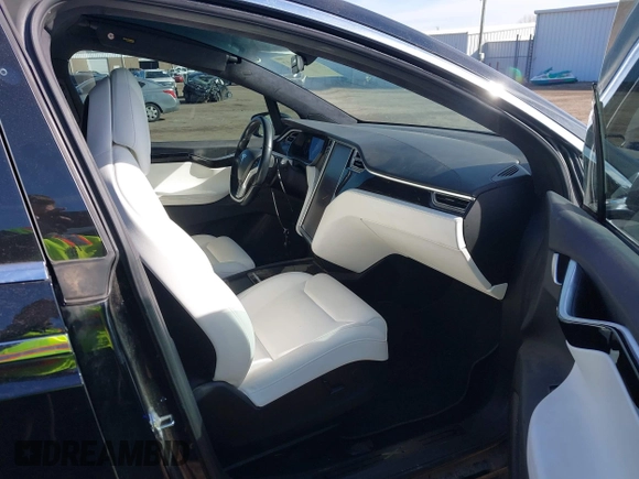 2018 Tesla Model X 75D with VIN 5YJXCDE44JF091690, listed as a IAAI auction lot 41585617 with 128,826 mi miles and . Bid and sale history available at DreamBid. Image 5.