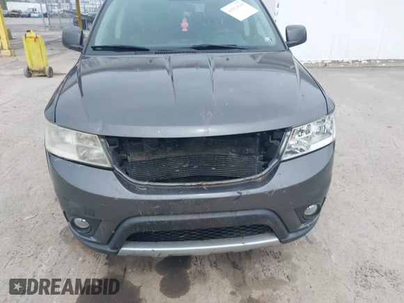 2014 Dodge Journey SXT z VIN 3C4PDDBG2ET161528, wystawiony jako IAAI lot #41932649 z przebiegiem 161 597 mil mil oraz . Historia ofert i sprzedaży dostępna na DreamBid. Obrazek 6.