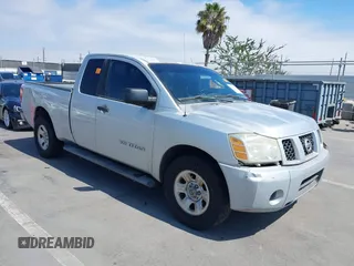 2006 Nissan Titan SE with VIN 1N6AA06A06N542516, listed as a IAAI auction lot 42736458 with 157,824 mi miles and . Bid and sale history available at DreamBid. Image 1.