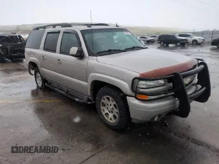 2004 Chevrolet Suburban Z71 z VIN 3GNFK16Z44G305168, wystawiony jako Copart lot #53900955 z przebiegiem 186 770 mil mil oraz Szkoda całkowita • Salvage title. Historia ofert i sprzedaży dostępna na DreamBid. Obrazek 14.