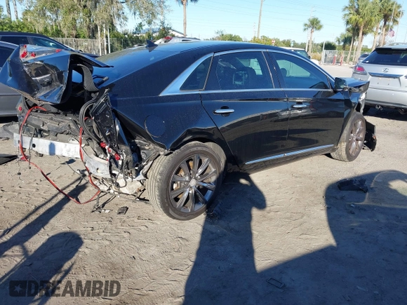 2014 Cadillac XTS with VIN 2G61L5S34E9261034, listed as a IAAI auction lot 41250779 with 178,218 mi miles. Bid and sale history available at carsss.com. Image 4.
