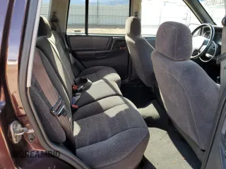 1997 Jeep Grand Cherokee Laredo with VIN 1J4GZ58S1VC747713, listed as a Copart auction lot 55290275 with 159,846 mi miles and Salvage title. Bid and sale history available at DreamBid. Image 10.